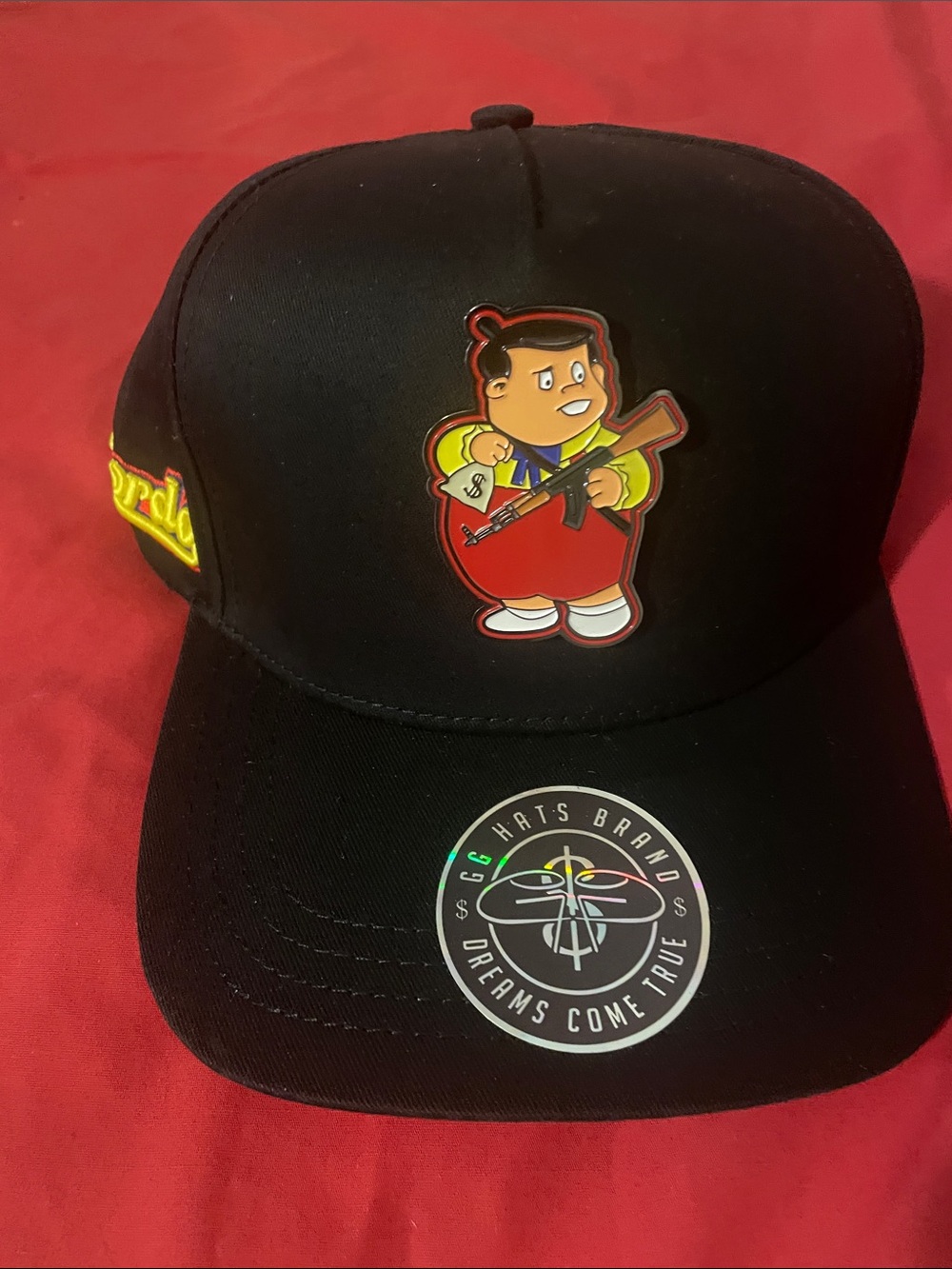 Black Trucker Hat with Gordo Metal Patch